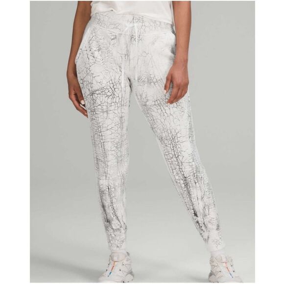 Lululemon Pants - Lululemon Warm Down 7/8 Length Joggers White & Gray Marble sz 10 EUC